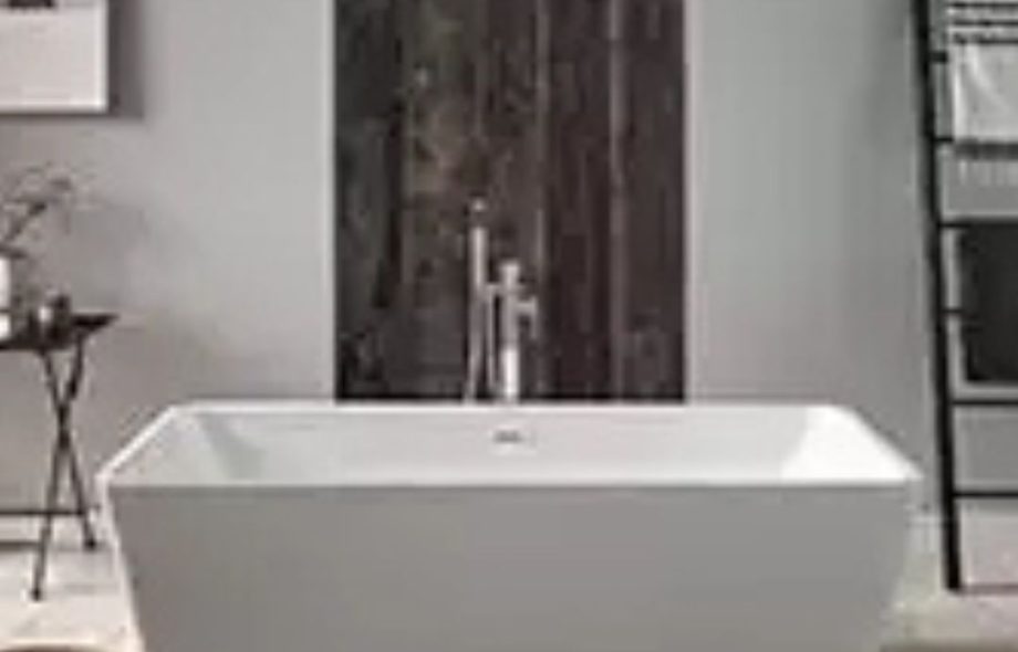 Sleek white KartellUK radiator installed in a modern UK living space